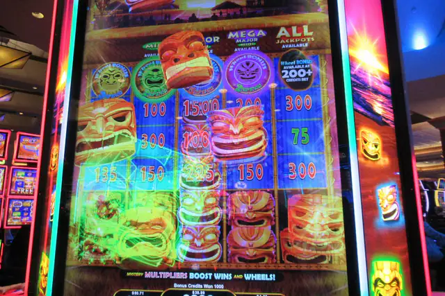 Bright video slot screen with a five-reel grid and multiplier wheel bonus